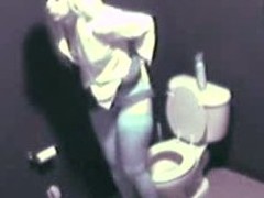 Classy blonde comes close by toilet and starts masturbating while hidden voyeur camera memories wholeness this shameless floozy is doing yon her racy pussy.
