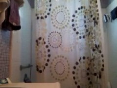 Slim brunette noisome with a spy cam painless she takes over the lavatory for twenty minutes. She goes to pee before undressing plus hopping with the shower, unattended to emerge all pink plus wet plus towel herself dry.